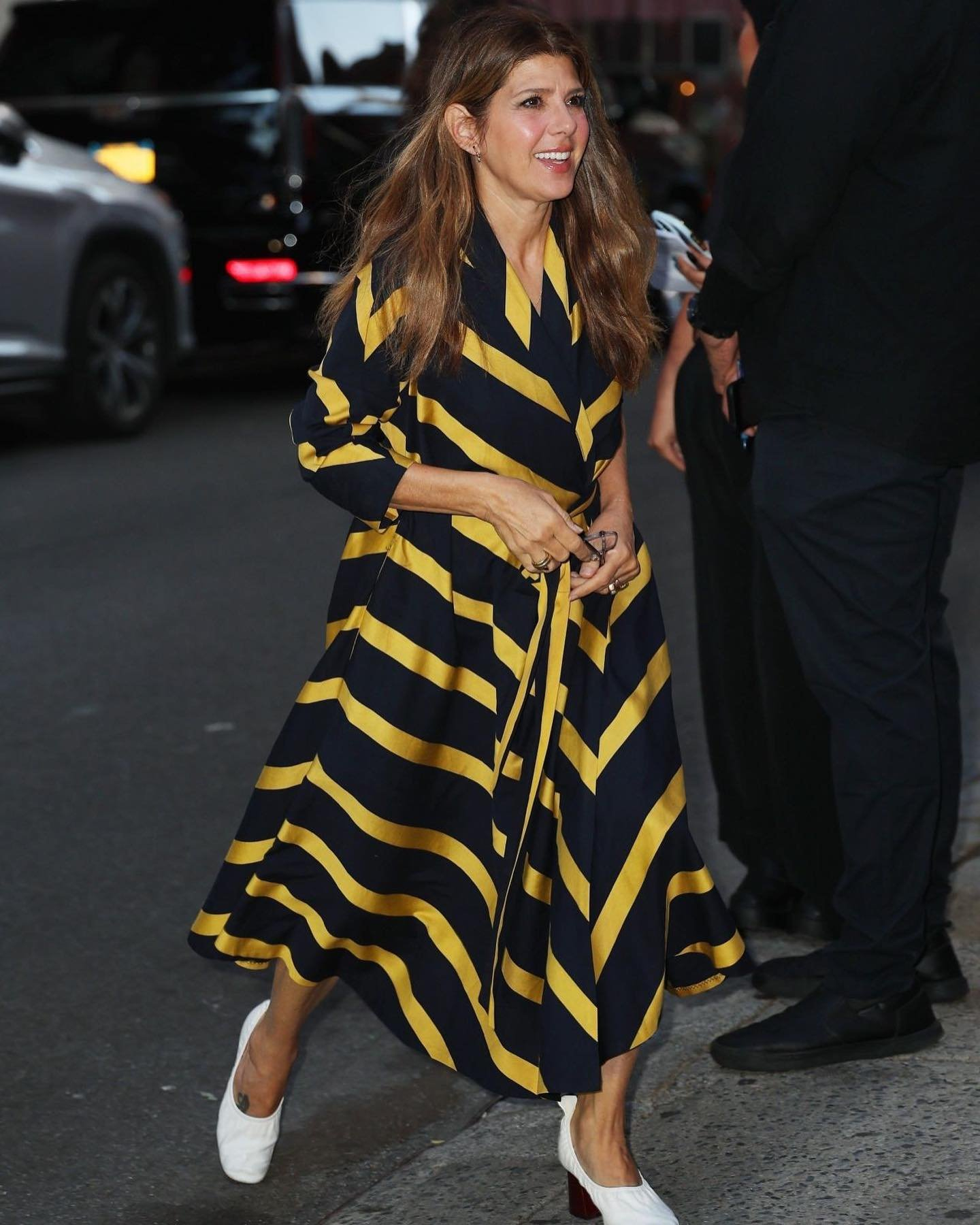 Marisa Tomei in striped dress.